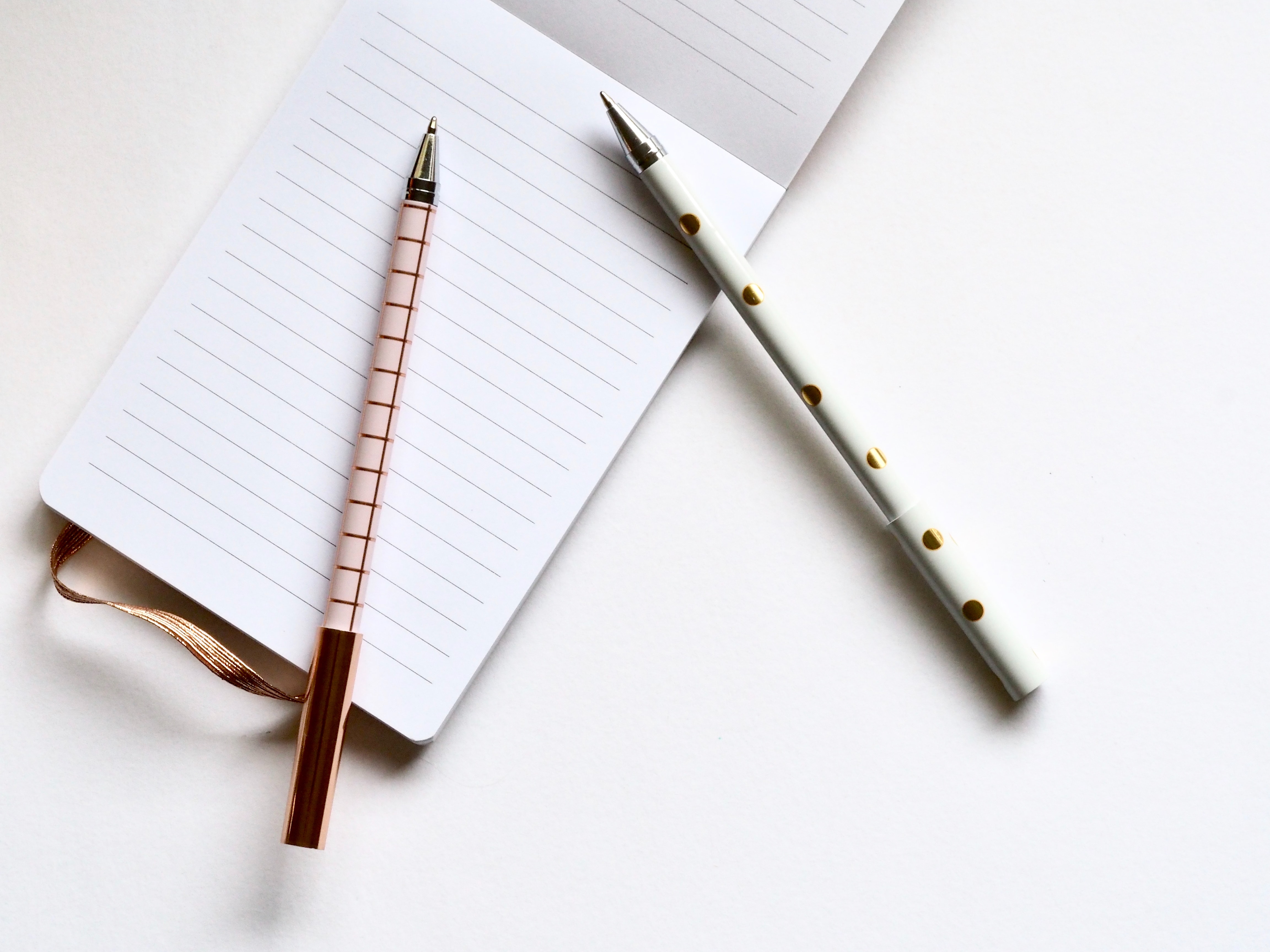 This is a notebook and pens.
